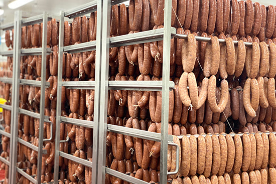 Assorted artisan sausages on a production table