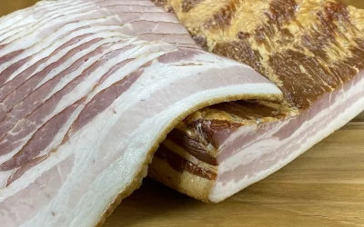 Bacon dishes and a person tasting bacon
