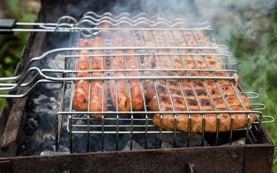 Smoked sausages over coals