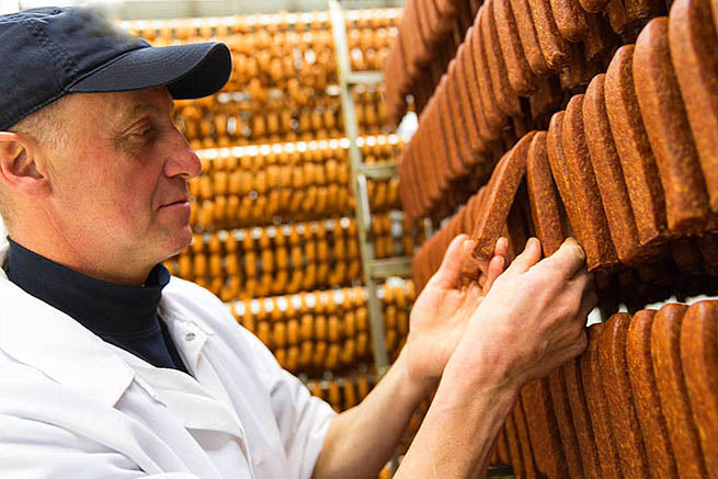 Josef at work in a butcher shop