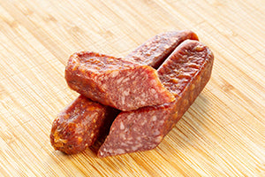 Landjäger sausage on a wooden board